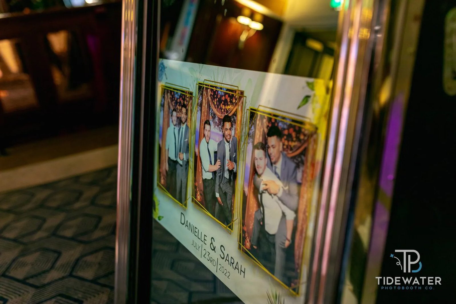 Mirror photo booth GIF capture showing guests interacting with the mirror booth