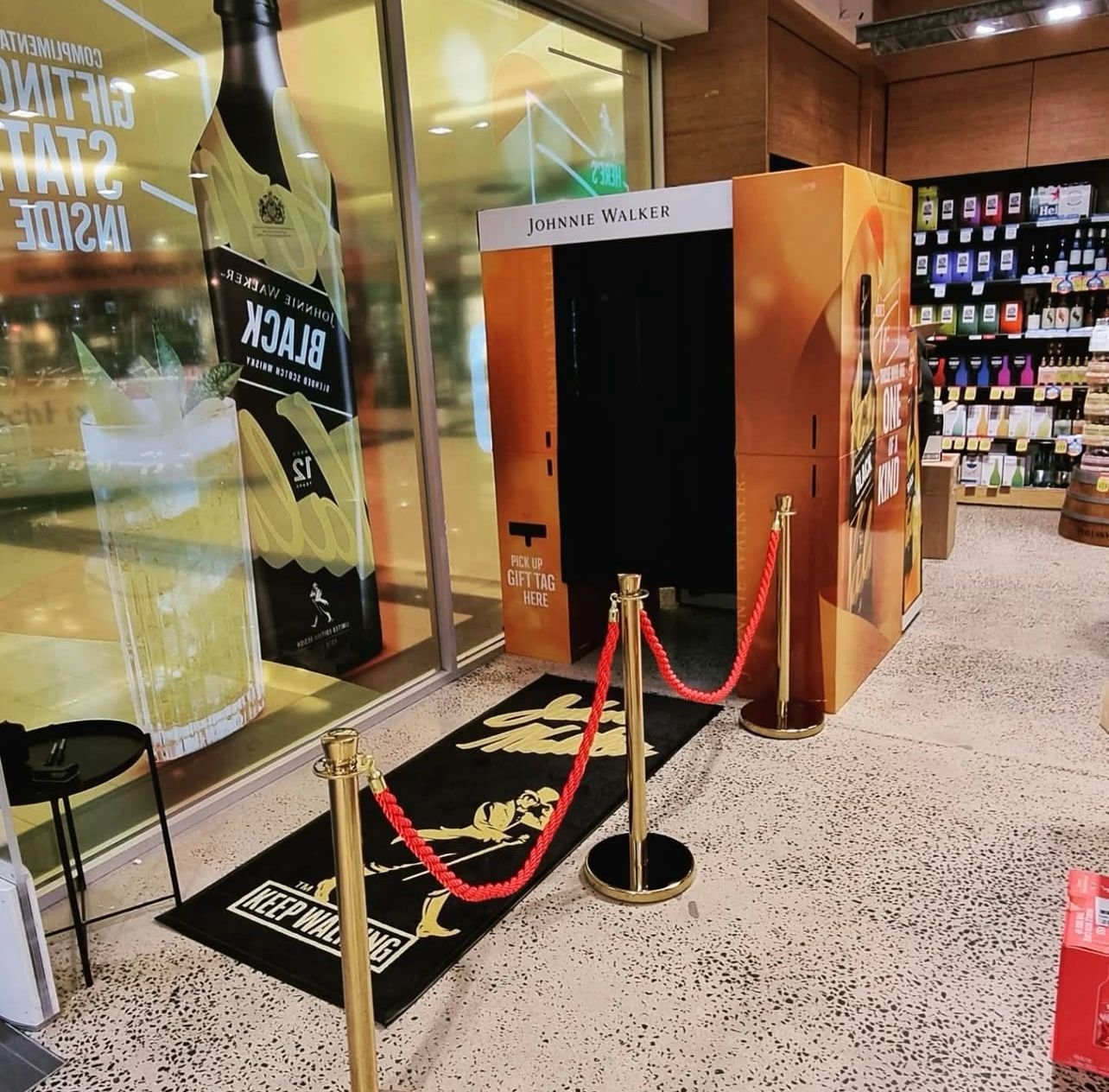 Guests using enclosed photo booth